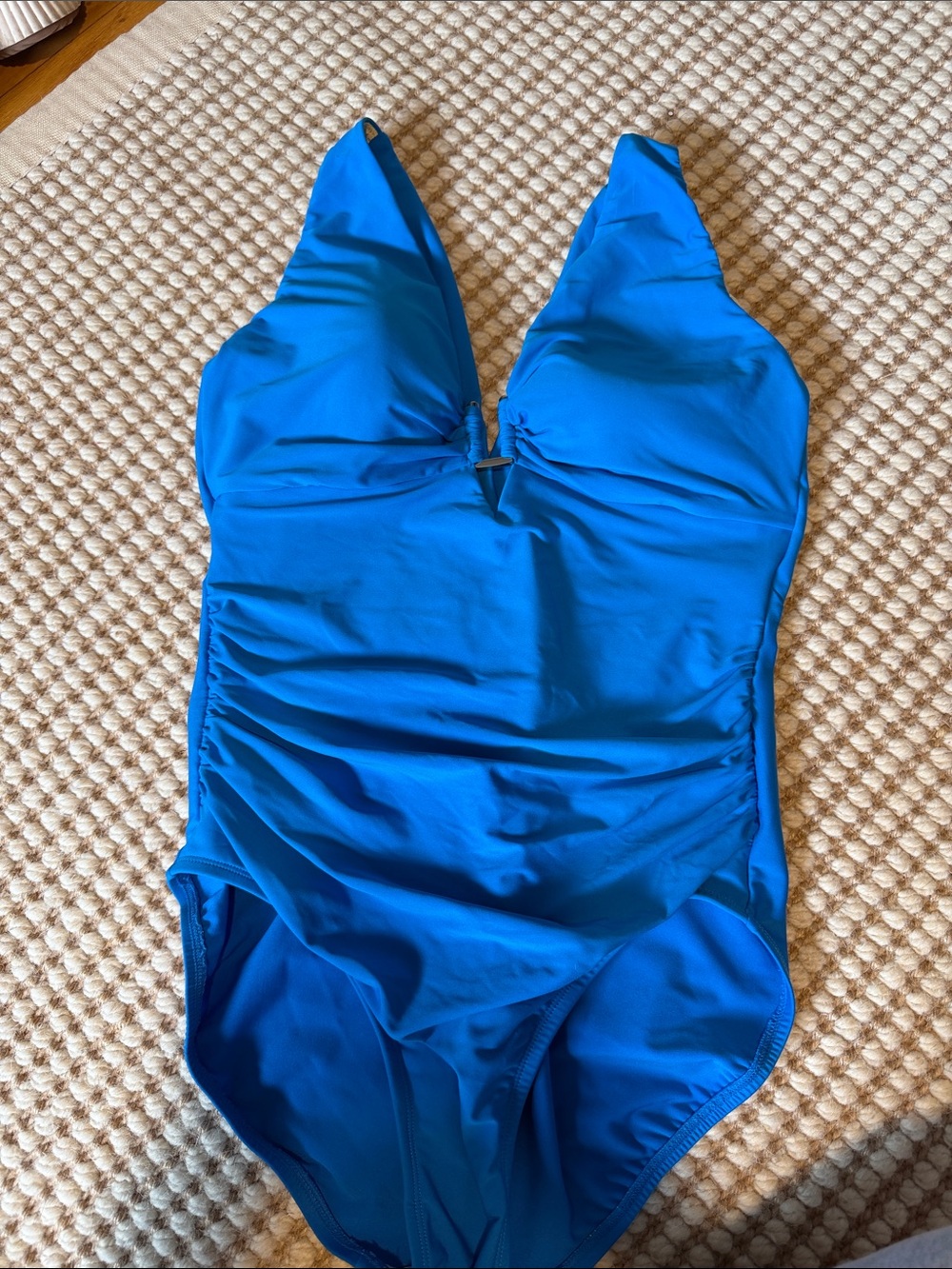 Women’s, one piece, size 10. Beautiful blue. Magic suit brand